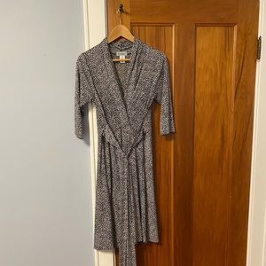 Size M/L knee length dress by Karina Dress.